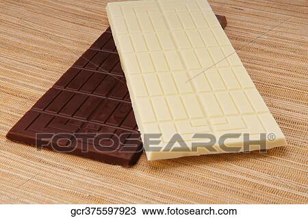 Close-up of bars of white and brown chocolate View Large Photo Image Stock Image - Close-up of bars of white and brown chocolate. Fotosearch