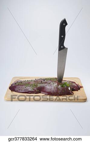 Close-up of beef kidneys on a wooden board View Large Photo Image Picture - Close-up of beef kidneys on a wooden board. Fotosearch