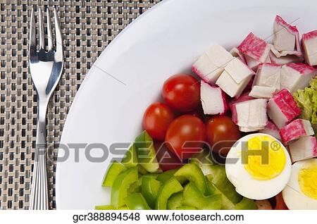 Close-up of boiled eggs and cherry tomatoes View Large Photo Image Stock Photo - Close-up of boiled eggs and cherry tomatoes. Fotosearch