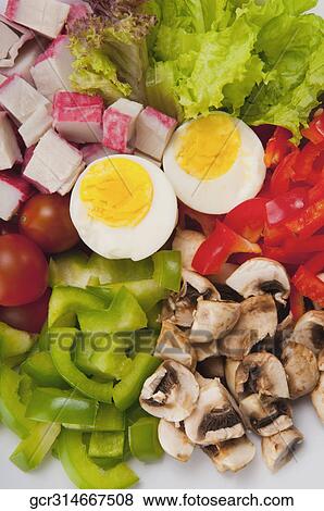 Close-up of boiled eggs with salad View Large Photo Image Stock Photo - Close-up of boiled eggs with salad. Fotosearch