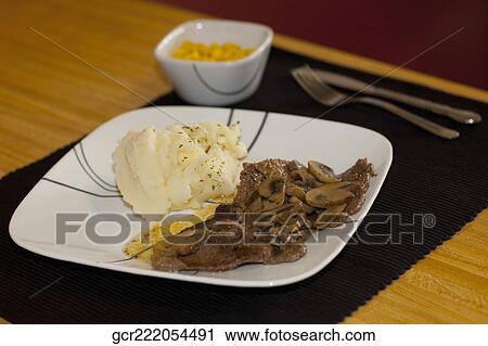 Close-up of braised lamb with mashed potatoes View Large Photo Image Stock Image - Close-up of braised lamb with mashed potatoes. Fotosearch