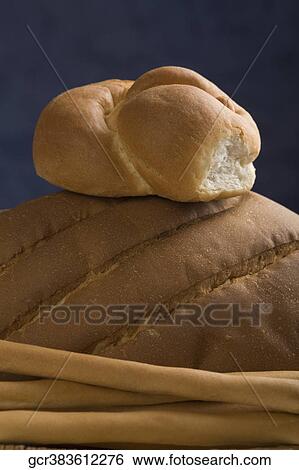 Close-up of bread sticks with buns View Large Photo Image Stock Photograph - Close-up of bread sticks with buns. Fotosearch