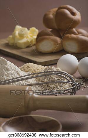 Close-up of breads and butter on cutting board View Large Photo Image Stock Photo - Close-up of breads and butter on cutting board. Fotosearch