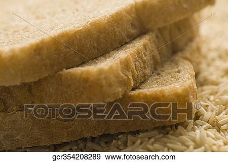 Close-up of breads with brown rice View Large Photo Image Stock Photo - Close-up of breads with brown rice. Fotosearch