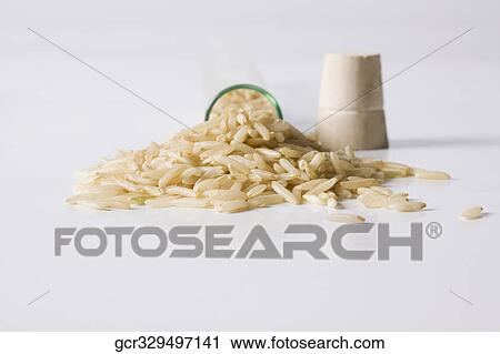 Close-up of brown rice in a test tube View Large Photo Image Stock Image - Close-up of brown rice in a test tube. Fotosearch