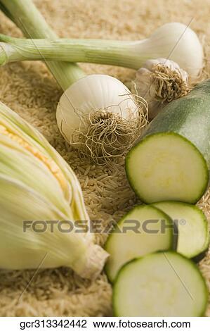 Close-up of brown rice with vegetables View Large Photo Image Stock Image - Close-up of brown rice with vegetables. Fotosearch