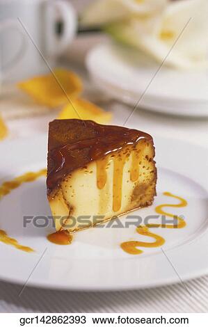 Close-up of caramel custard on a plate View Large Photo Image Stock Image - Close-up of caramel custard on a plate. Fotosearch