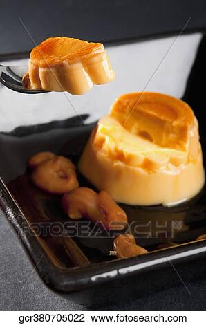 Close-up of caramel custard View Large Photo Image Stock Image - Close-up of caramel custard . Fotosearch