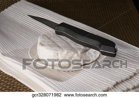 Close-up of cheese and knife View Large Photo Image Stock Image - Close-up of cheese and knife. Fotosearch