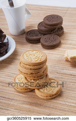 Close-up of chocolate cookies and coffee View Large Photo Image Stock Photography - Close-up of chocolate cookies and coffee. Fotosearch