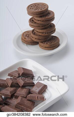 Close-up of chocolate cookies with chocolate pieces View Large Photo Image Stock Image - Close-up of chocolate cookies with chocolate pieces. Fotosearch