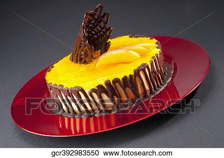 Close-up of chocolate garnish on lemon flan cake View Large Photo Image Stock Image - Close-up of chocolate garnish on lemon flan cake. Fotosearch