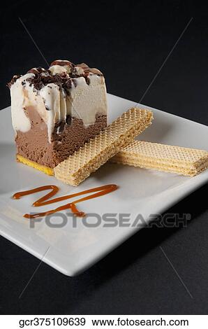 Close-up of chocolate mousse cake with wafers View Large Photo Image Stock Photo - Close-up of chocolate mousse cake with wafers. Fotosearch