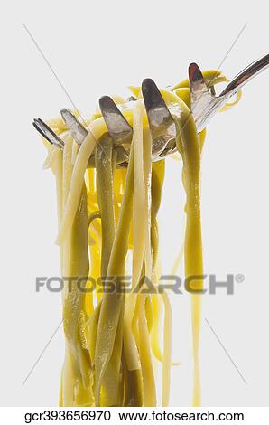 Close-up of cooked spaghetti on a ladle View Large Photo Image Stock Image - Close-up of cooked spaghetti on a ladle. Fotosearch