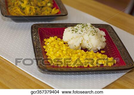 Close-up of corn and mashed potatoes View Large Photo Image Picture - Close-up of corn and mashed potatoes. Fotosearch