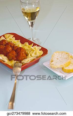 Close-up of farfalle pasta and meatballs View Large Photo Image Stock Photo - Close-up of farfalle pasta and meatballs. Fotosearch