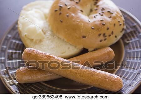 Close-up of frankfurters with a bagel View Large Photo Image Stock Photo - Close-up of frankfurters with a bagel. Fotosearch