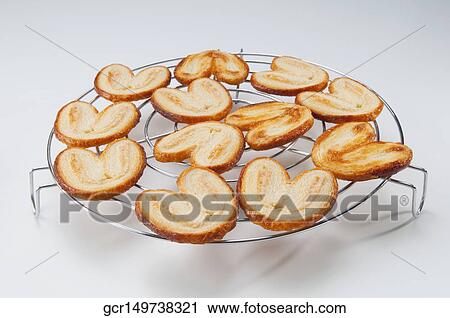 Close-up of French hearts on a stand View Large Photo Image Stock Image - Close-up of French hearts on a stand. Fotosearch