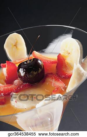 Close-up of fruit trifle in a martini glass View Large Photo Image Stock Photography - Close-up of fruit trifle in a martini glass. Fotosearch