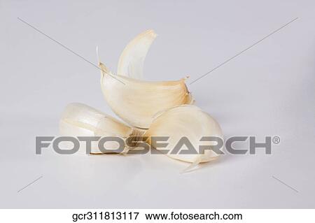 Close-up of garlic bulbs View Large Photo Image Stock Photo - Close-up of garlic bulbs. Fotosearch