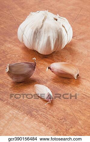 Close-up of garlic pods View Large Photo Image Picture - Close-up of garlic pods. Fotosearch
