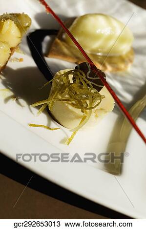 Stock Image - Close-up of gourmet tarts. Fotosearch