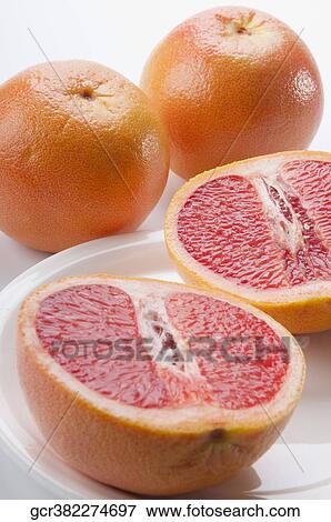Close-up of grapefruits View Large Photo Image Stock Photo - Close-up of grapefruits. Fotosearch