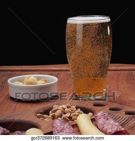 Close-up of ham and cheese rolls served with beer View Large Photo Image Stock Image - Close-up of ham and cheese rolls served with beer. Fotosearch