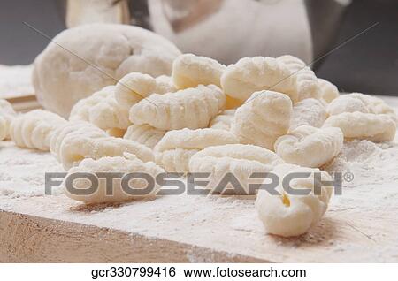 Close-up of homemade gnocchi View Large Photo Image Stock Photograph - Close-up of homemade gnocchi. Fotosearch