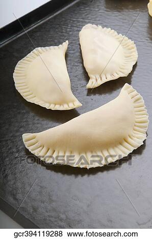 Stock Photo - Close-up of homemade panzerotti. Fotosearch