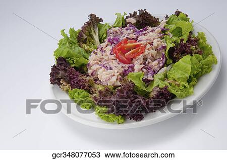 Close-up of lettuce and tomato salad View Large Photo Image Stock Image - Close-up of lettuce and tomato salad. Fotosearch