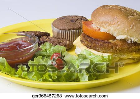 Close-up of lettuce salad with a hamburger View Large Photo Image Stock Photo - Close-up of lettuce salad with a hamburger. Fotosearch