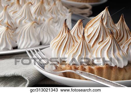 Close-up of meringue pies View Large Photo Image Stock Image - Close-up of meringue pies. Fotosearch