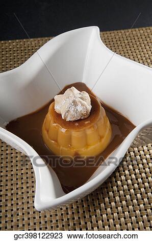 Close-up of meringue topped caramel custard View Large Photo Image Stock Image - Close-up of meringue topped caramel custard. Fotosearch