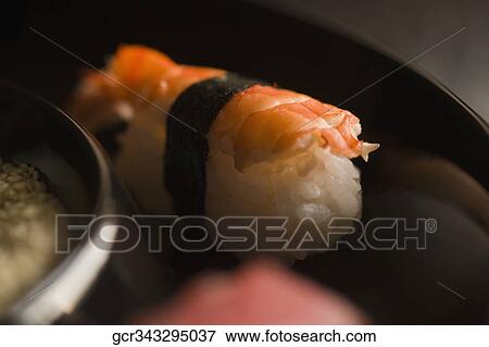 Close-up of nigiri sushi in a plate View Large Photo Image Stock Photo - Close-up of nigiri sushi in a plate. Fotosearch