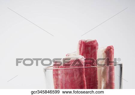 Close-up of octopus fingers in a glass View Large Photo Image Stock Photo - Close-up of octopus fingers in a glass. Fotosearch