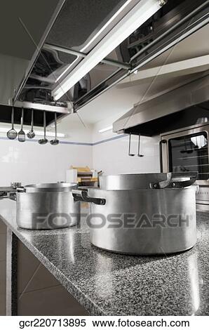 Close-up of pans in the kitchen View Large Photo Image Stock Photography - Close-up of pans in the kitchen. Fotosearch