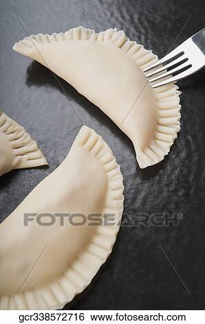 Close-up of panzerotti View Large Photo Image Stock Photograph - Close-up of panzerotti. Fotosearch