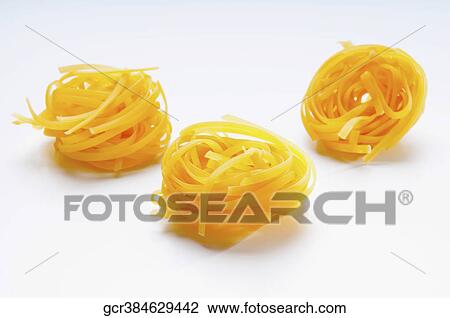Stock Image - Close-up of pappardelle pasta. Fotosearch