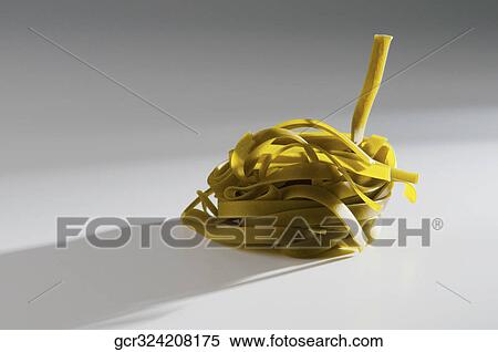 Close-up of pappardelle pasta View Large Photo Image Stock Photography - Close-up of pappardelle pasta. Fotosearch
