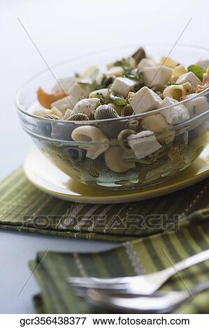 Close-up of pasta in a bowl View Large Photo Image Stock Photo - Close-up of pasta in a bowl. Fotosearch