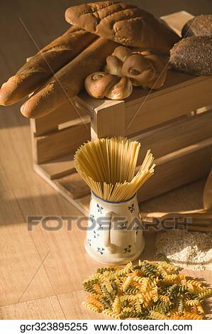 Close-up of pasta with breads View Large Photo Image Stock Photography - Close-up of pasta with breads. Fotosearch