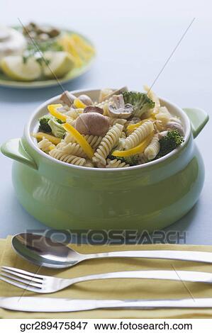 Stock Photo - Close-up of pasta with tableware. Fotosearch