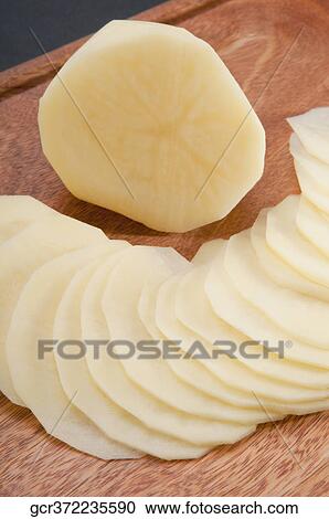 Close-up of potato slices View Large Photo Image Stock Image - Close-up of potato slices. Fotosearch