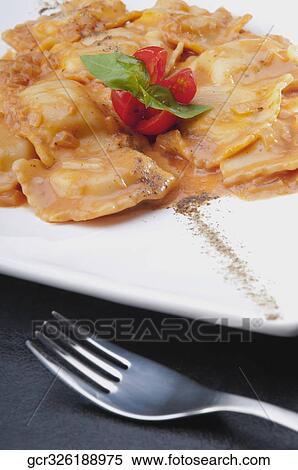 Stock Photography - Close-up of ravioli on a plate. Fotosearch