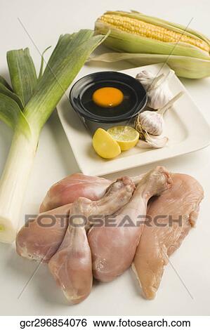 Close-up of raw chicken with ingredients View Large Photo Image Stock Photograph - Close-up of raw chicken with ingredients. Fotosearch