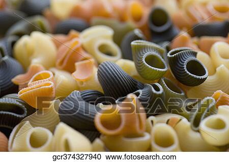 Close-up of raw macaroni View Large Photo Image Stock Image - Close-up of raw macaroni. Fotosearch