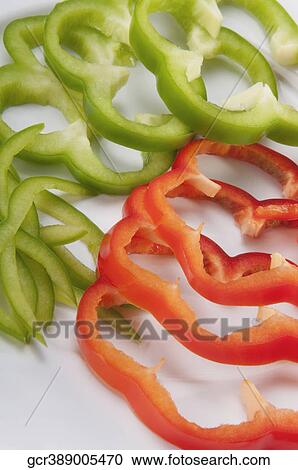 Close-up of raw sliced peppers View Large Photo Image Stock Image - Close-up of raw sliced peppers. Fotosearch