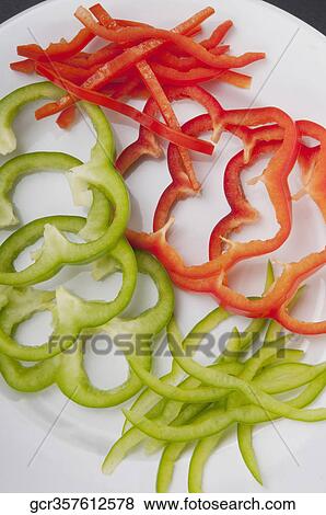 Close-up of raw sliced peppers View Large Photo Image Stock Photo - Close-up of raw sliced peppers. Fotosearch