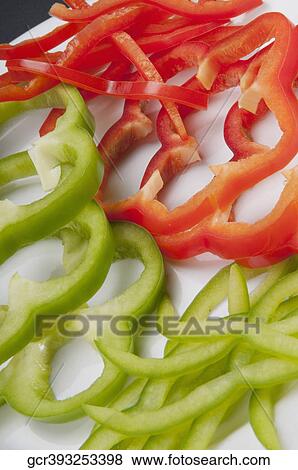 Close-up of raw sliced peppers View Large Photo Image Stock Photo - Close-up of raw sliced peppers. Fotosearch